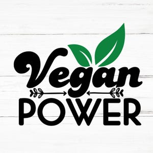 May include: Black and green graphic with the text "Vegan Power" and two green leaves. The text is in a bold, stylized font.