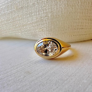 18K Oval Lab Diamond Ring, in a Signet Ring style featuring a bezel set 2ct Oval Lab Diamond | Ella Creations Jewelry