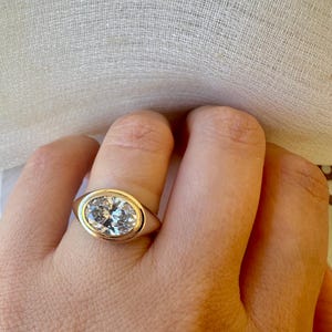 18K Oval Lab Diamond Ring, in a Signet Ring style featuring a bezel set 2ct Oval Lab Diamond | Ella Creations Jewelry