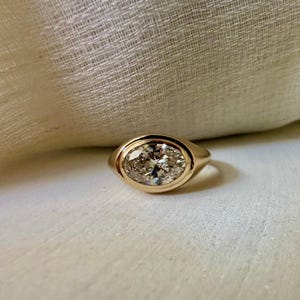 18K Oval Lab Diamond Ring, in a Signet Ring style featuring a bezel set 2ct Oval Lab Diamond | Ella Creations Jewelry