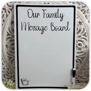 May include: A rustic wooden sign with the text "Welcome to our home" in white lettering. The sign features a distressed finish and a simple, inviting design, perfect for a front porch or entryway.