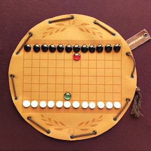 Juego de mesa romano antiguo Latrunculi en funda de piel sintética
