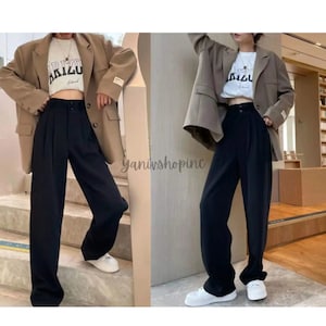 Pantalones de dama negros con botones para oficina