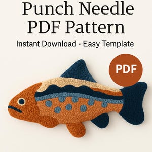 May include: A punch needle PDF pattern featuring a fish design. The fish is primarily orange with blue and beige accents. The text "Punch Needle PDF Pattern" and "Instant Download - Easy Template" are displayed at the top.