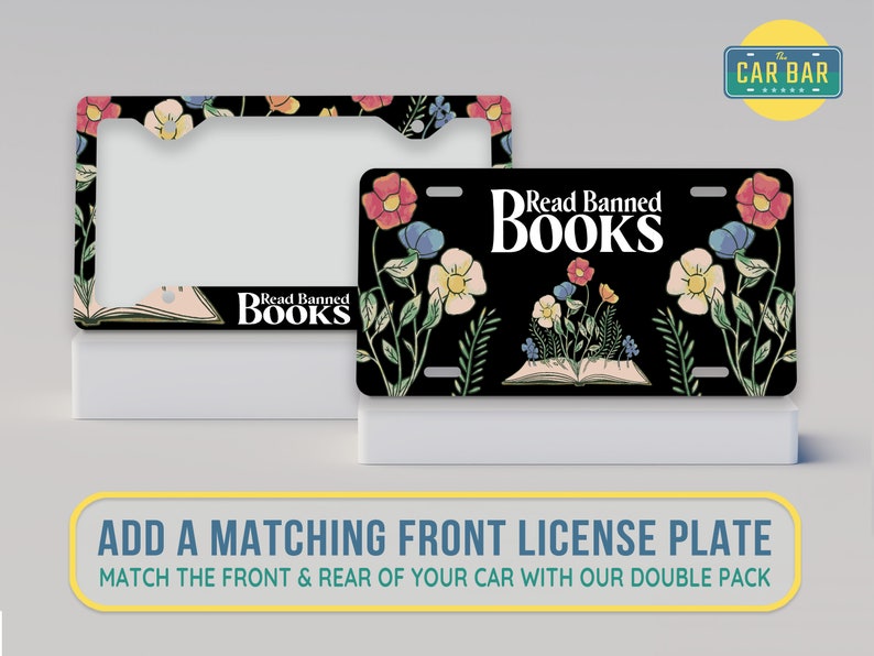 May include: Black license plate frame with a floral design and the text "Read Banned Books". The frame is designed to fit a standard US license plate.