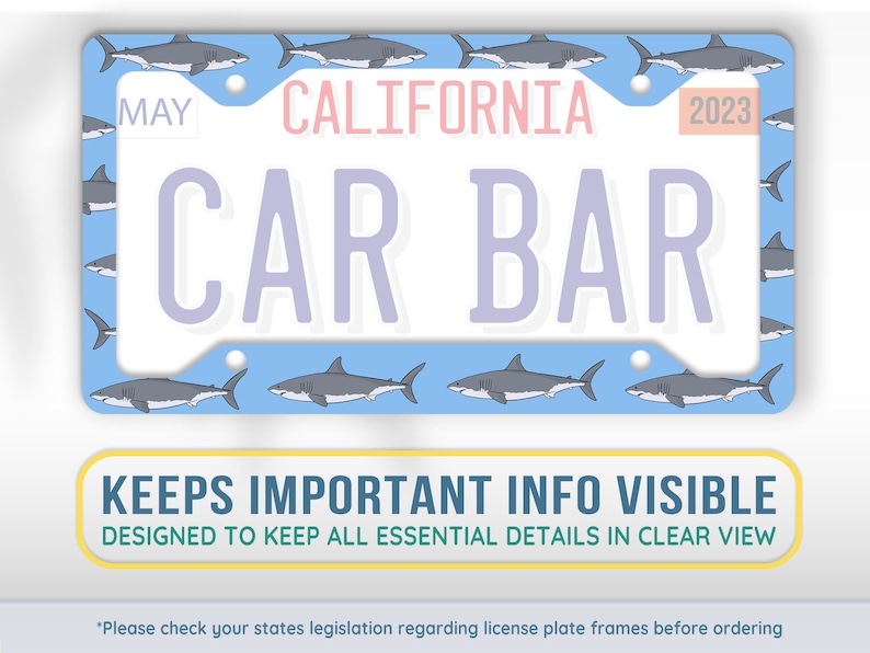May include: A blue license plate frame with a shark pattern. The frame has a white background with the text "MAY", "CALIFORNIA", "2023", "CAR BAR" and "KEEPS IMPORTANT INFO VISIBLE". The text "DESIGNED TO KEEP ALL ESSENTIAL DETAILS IN CLEAR VIEW" is also included.