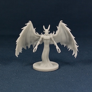 May include: A white painted miniature figurine of a demon with wings. The demon has a humanoid body with horns and a long tail. The wings are spread out and have a jagged edge.