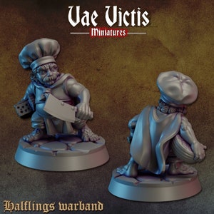May include: A miniature figurine of a halfling chef holding a cleaver and a dice. The figurine is painted in a light gray color and is standing on a round base. The figurine is part of a warband set.