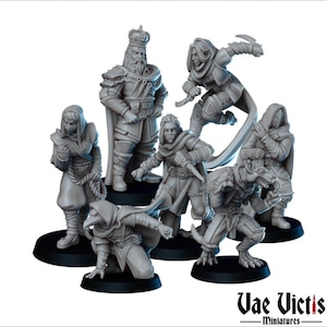 May include: Set of six grey painted miniature figures, including a king, a hooded figure, and four figures with daggers. The figures are standing on black bases.