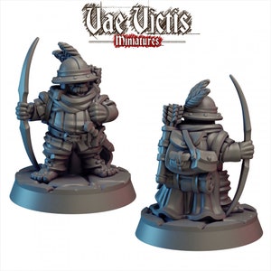 May include: Two gray painted miniature figurines of a dwarf archer wearing armor and holding a bow and arrow. The dwarf on the left is facing forward and the dwarf on the right is facing to the right. Both dwarfs are standing on a gray base.
