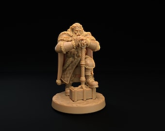 May include: A miniature figurine of a bearded man wearing a fur-trimmed cloak and armor, holding a large hammer. He is kneeling on a base with a smaller hammer.