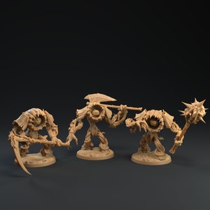 May include: Three miniature figures of plant-like creatures with humanoid features. Each figure is painted in a light brown color and has a different weapon. The figure on the left is holding a scythe, the middle figure is holding an axe, and the figure on the right is holding a spiked club.