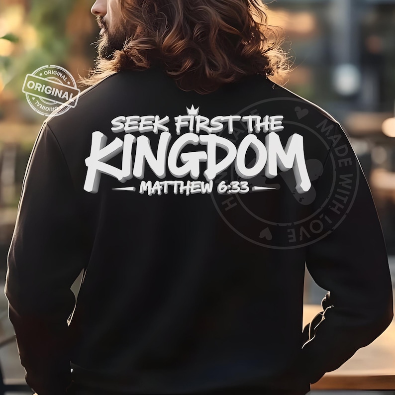 May include: Black sweatshirt with the text "SEEK FIRST THE KINGDOM - MATTHEW 6:33" in white, 3D-style lettering. The sweatshirt has a small crown above the word "KINGDOM". The image also includes a "ORIGINAL" stamp and a "MADE WITH LOVE" stamp.