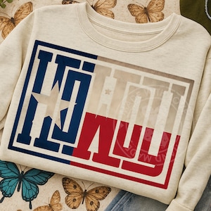 May include: A light beige sweatshirt with a graphic of the Texas flag in navy blue, red, and white. The word "TEXAS" is displayed within the flag design. The sweatshirt has a crew neck and long sleeves.