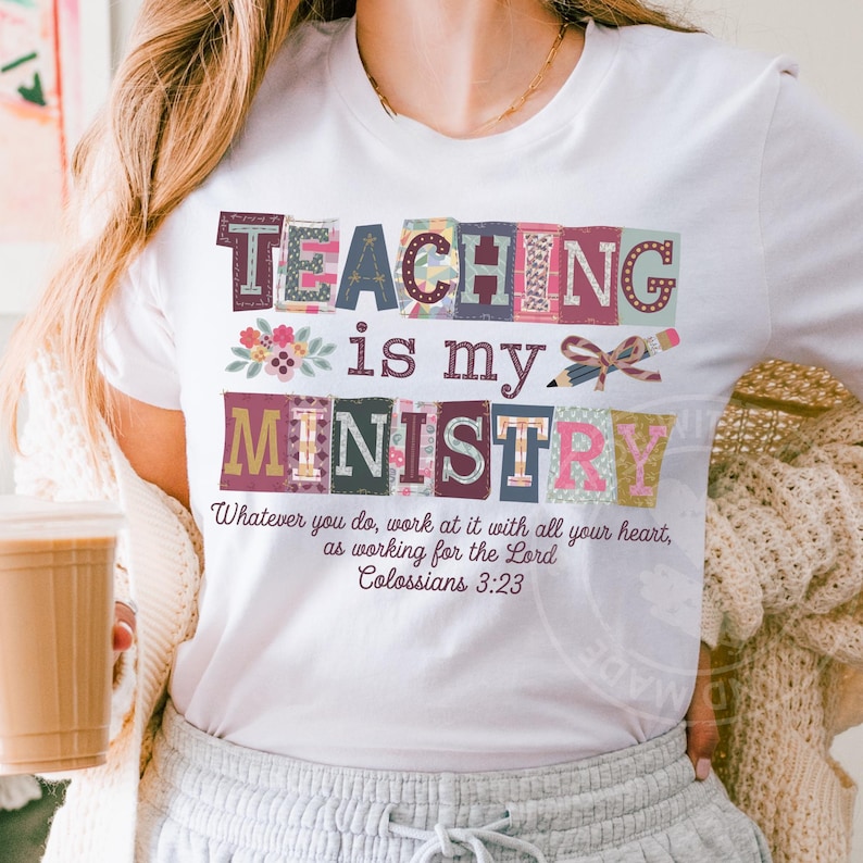 May include: White t-shirt with the words "TEACHING is my MINISTRY" in colorful block letters. The shirt also features the Bible verse Colossians 3:23. A pencil and floral design are also included.