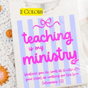 May include: Cream-colored t-shirt with a pink bow and the words "teaching is my ministry" in pink. The shirt has light blue vertical stripes and the text "Whatever you do, work at it with your heart, as working for the Lord, Colossians 3:23."