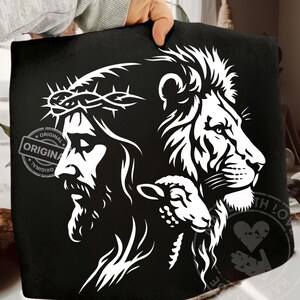 May include: Black graphic design featuring a white illustration of Jesus wearing a crown of thorns, a lion, and a lamb. The word "ORIGINAL" is printed on the left side. The design is on a black background.