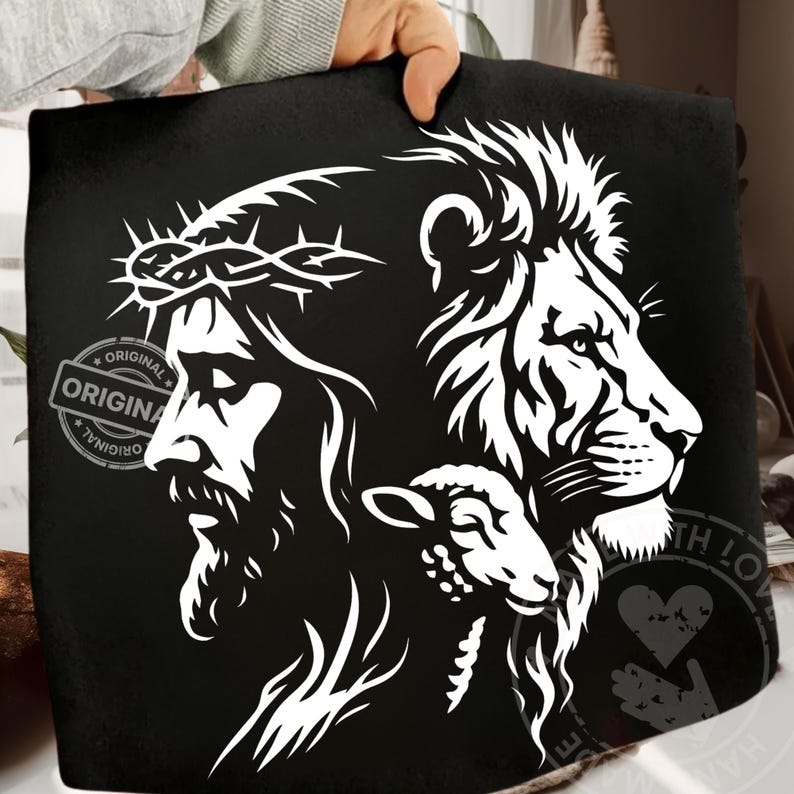May include: Black graphic design featuring a white illustration of Jesus wearing a crown of thorns, a lion, and a lamb. The word "ORIGINAL" is printed on the left side. The design is on a black background.