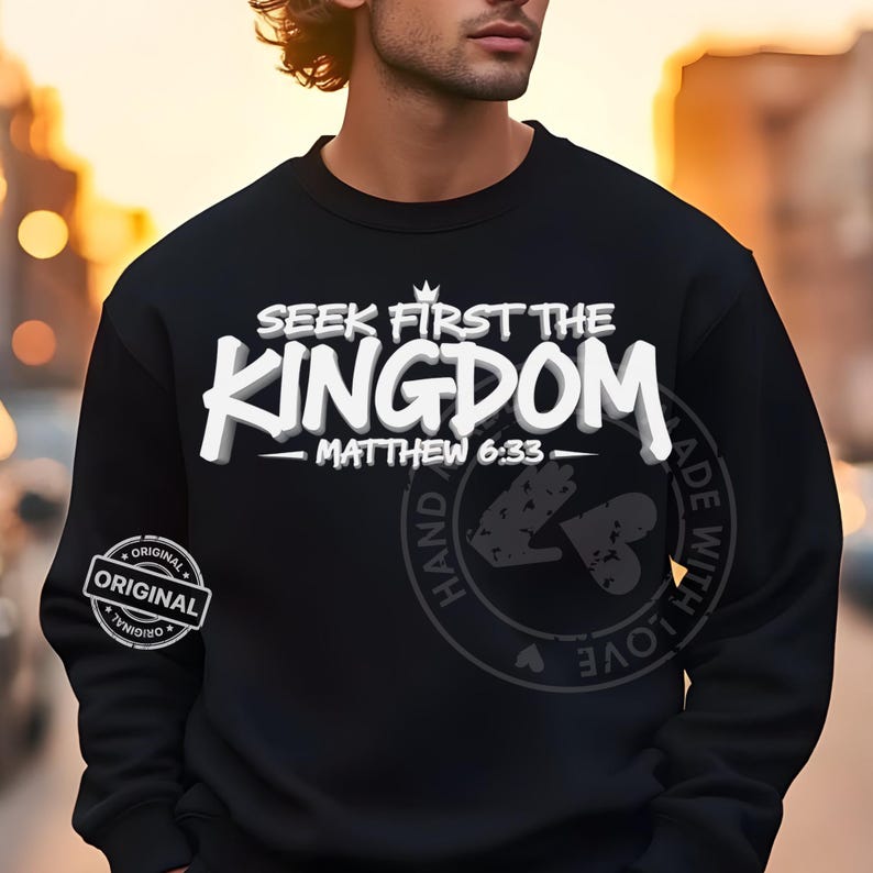 May include: Black sweatshirt with the text "SEEK FIRST THE KINGDOM" in white, with "MATTHEW 6:33" below. A circular graphic on the right side reads "HAND MADE WITH LOVE". An "ORIGINAL" stamp is on the left sleeve.
