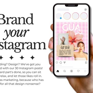 May include: A smartphone displays an Instagram post with the text "GUA sha" and a pink floral design. The phone is held in a hand, with the words "Brand your instagram" and additional text visible.