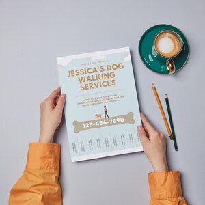 May include: A blue and white flyer with the text "Jessica's Dog Walking Services" and a phone number 123-456-7890. The flyer has a cartoon image of a person walking a dog.