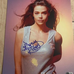 Denise Richards signed autographed 11 x 14 size photo Beckett Authenticated