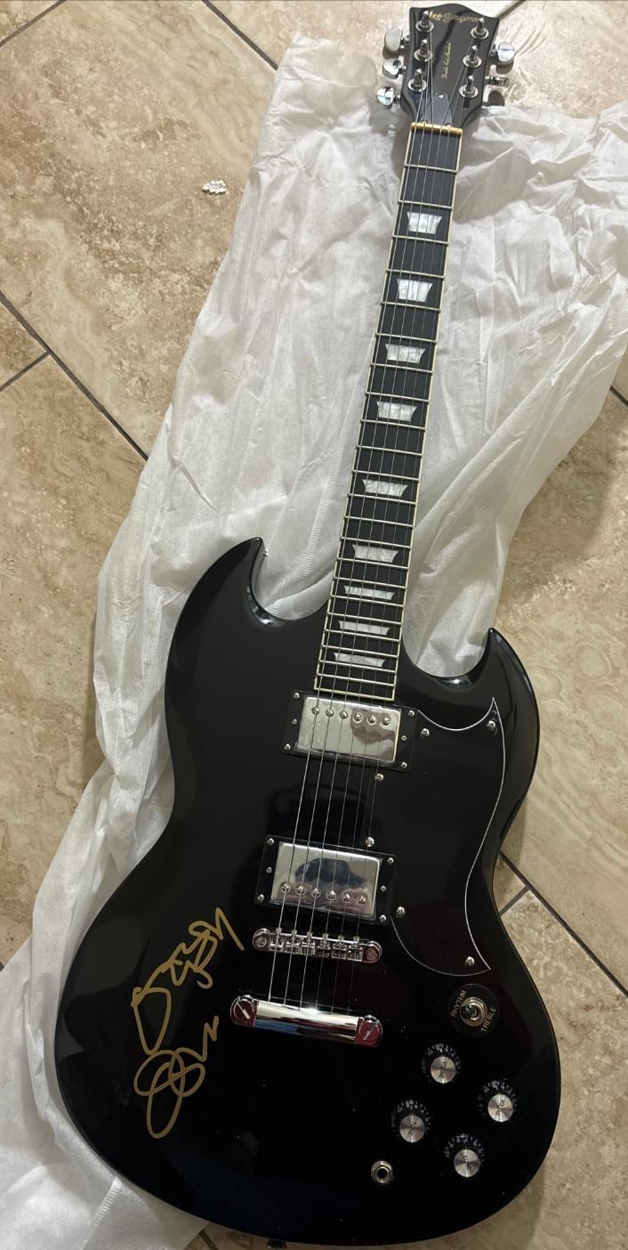 Ozzy Osbourne Black Sabbath autographed signed Guitar Beckett authenticated