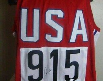 Carl Lewis Signed Autographed Team USA Olympics Jersey with JSA Authetication