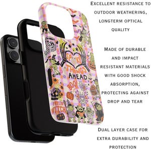 May include: A dual-layer phone case with a Halloween theme. The case has a black inner layer and a patterned outer layer with spooky illustrations, including skeletons, pumpkins, and the text "Spooky Things Ahead". Designed for extra durability and protection.