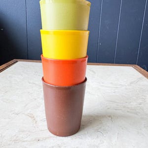 Set of four vintage Tupperware kids or juice cups