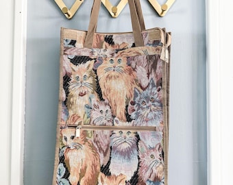 Rolling shopping bag featuring cat design