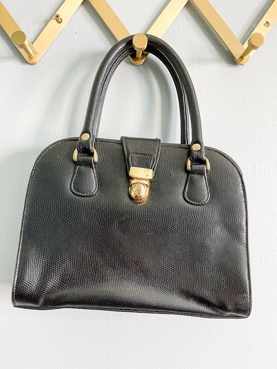 Faux snakeskin black handbag