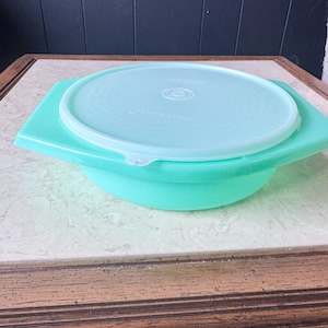 Vintage mint green Tupperware bowl with lid