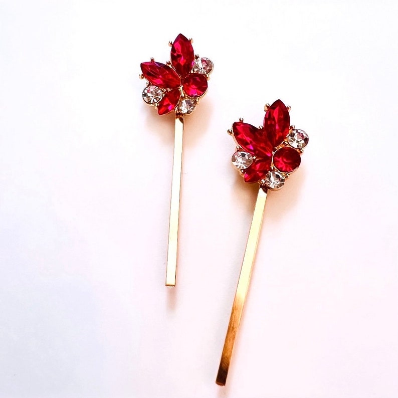 a set of 2 vintage inspired fuchsia pink with rhinestone jewel accents and gold base bobby pin set. Special occasion, gift idea, hair jewelry.