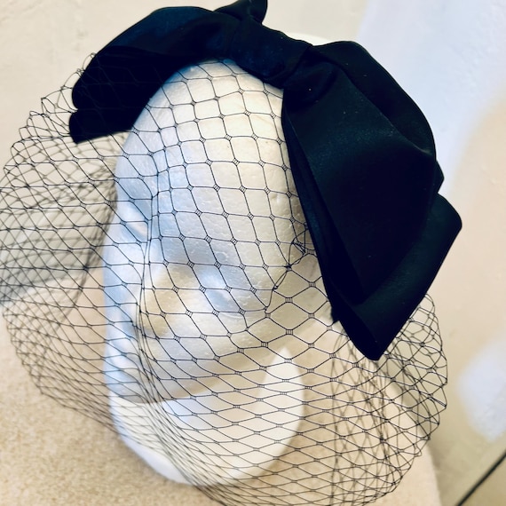 Large Black Satin Bow Headband with Fishnet Veil – Statement Hair Accessory for Special Occasions