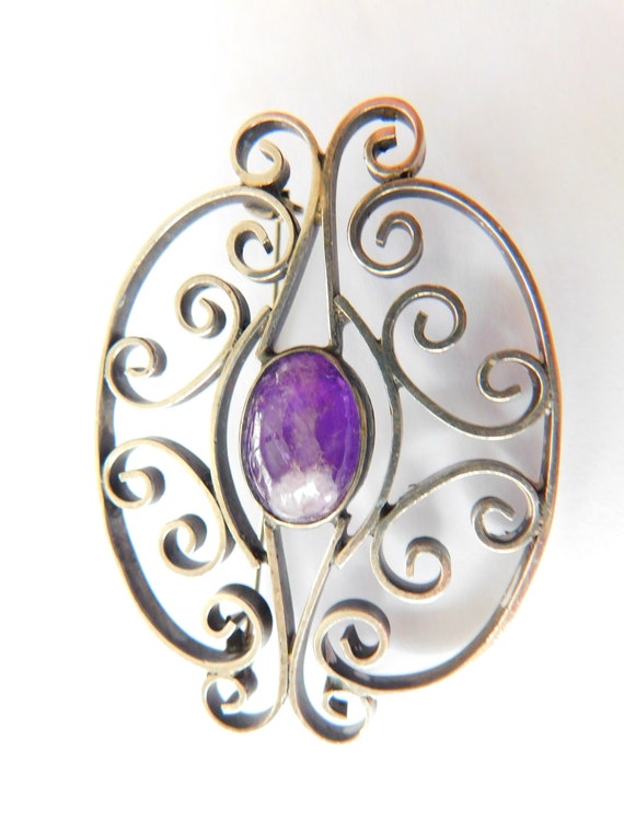 Stunning sterling-amethyst brooch