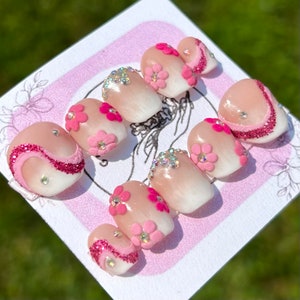 pink nails/ barbie/ barbie nails/ pink flower nails/ flower/ pink/ rhinestone nails/ ken/ swirl nails/ swirl/ombre nails/ reusable press-ons