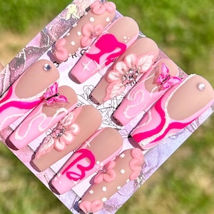 barbie nails/ barbie/ barbie movie/ pink nails/ press-ons/ reusable nails/ butterfly nails/ glitter nails/ pink swirls/ pink flowers/ pink