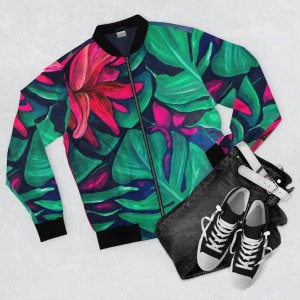 May include: A black bomber jacket with a colorful floral print featuring pink, green, and blue hues. The jacket has a zipper closure and ribbed cuffs and collar.
