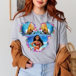 a woman wearing a shirt with a picture of a woman on it