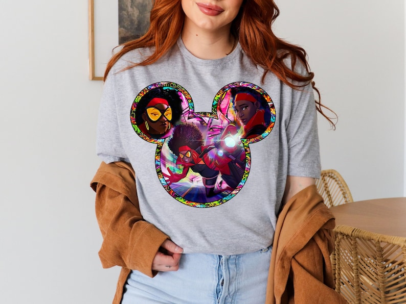 a woman with red hair wearing a mickey mouse shirt