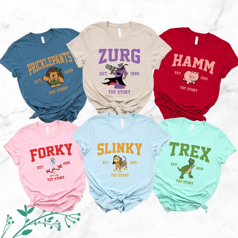 six tshirts of different colors on a marble surface