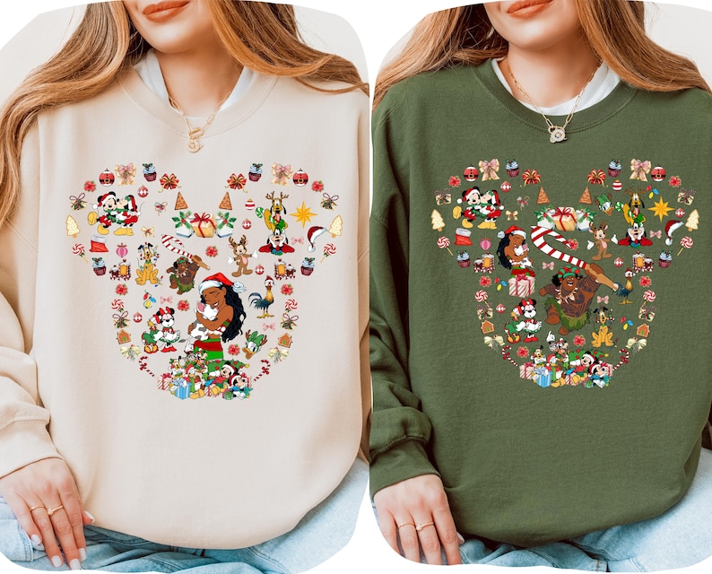 two women wearing sweaters with a Mickey Mouse theme. The sweaters are decorated with various Disney characters and holiday-themed elements, such as snowflakes, presents, and Christmas trees.