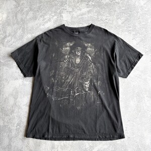 Camiseta negra descolorida vintage de WWE The Undertaker Grave Yards