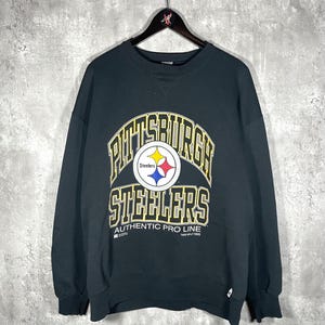 Camiseta vintage Russell Athletic de los Pittsburgh Steelers, cuello redondo, color negro, de los años 90