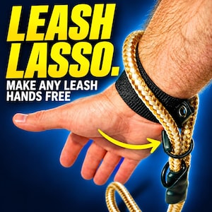 May include: A gold and white braided rope leash attachment featuring a black wrist strap with a metal grommet and black plastic hardware. The text LEASH LASSO. MAKE ANY LEASH HANDS FREE is displayed in large yellow and white letters.