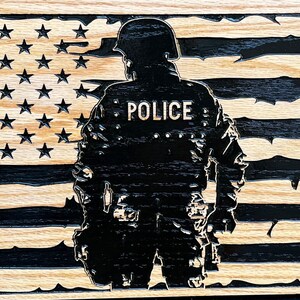 Tattered American Flag with Police Silhouette