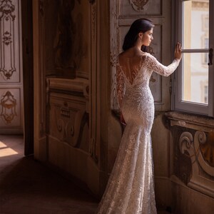 Timeless Mermaid Silhouette Wedding Dress Featuring a Graceful Boat Neckline, Delicate Cap Sleeves, and Elegant for a Sophisticated Bridal Look