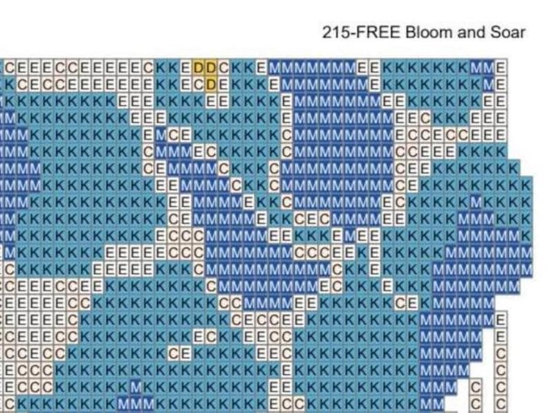 May include: A cross-stitch pattern chart titled 215-FREE Bloom and Soar, featuring a grid of squares filled with letters C, E, K, M, and D, representing different thread colors in shades of blue, light blue, and white for embroidery projects.