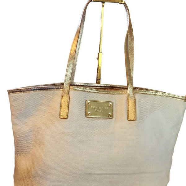 Michael Kors cream colored with gold leather trim tote bag EST 1981